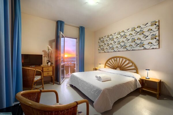 Sunsets like these are the perfect ending to your day in Scoglitti, right from the comfort of your room at Hotel Mida.